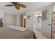An airy bedroom with a view to the bathroom, closet and neutral decor providing a serene and inviting atmosphere at 7909 Canna Dr, Port Richey, FL 34668