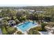 Outdoor community lap pool with a poolside cabana and lounge chairs offers a relaxing recreational space at 8015 Hampton Glen Dr, Tampa, FL 33647