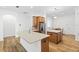 Bright kitchen with stainless steel appliances, a center island, and adjacent dining area at 8015 Hampton Glen Dr, Tampa, FL 33647