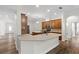 Gourmet kitchen features stainless steel appliances, a large island, and adjacent dining area at 8015 Hampton Glen Dr, Tampa, FL 33647