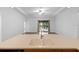 Modern kitchen with stainless steel appliances and ample counter space leading out to a backyard at 8015 Hampton Glen Dr, Tampa, FL 33647
