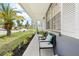 The exterior of the house has a charming seating area on the porch, perfect for relaxing at 9126 Greenbriar Ln, Port Richey, FL 34668