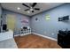 Home office featuring wood-look floors and light gray walls at 10149 Briar Cir, Hudson, FL 34667