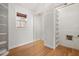 Walk-in closet features window for natural light and custom built in shelving at 1021 15Th St, Palm Harbor, FL 34683