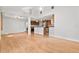 Bright and airy living space with hardwood floors, white walls, and an open floor plan at 1021 15Th St, Palm Harbor, FL 34683
