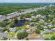 Aerial view of the property showcasing its proximity to nearby shops, restaurants, and community amenities at 10408 Butia Pl, Tampa, FL 33618