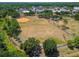 Aerial view of the park featuring a baseball field and walking paths at 10408 Butia Pl, Tampa, FL 33618