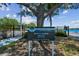 Close up of the 'Original Carrollwood' White Sands Beach private access sign at 10408 Butia Pl, Tampa, FL 33618