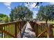 A wooden bridge leads to the park at 10408 Butia Pl, Tampa, FL 33618