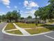 Charming single-story home with mature trees and a well-manicured front yard at 10408 Butia Pl, Tampa, FL 33618