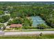 Aerial view of the neighborhood tennis courts for friendly matches, enhancing the community's recreational offerings and appeal at 10408 Butia Pl, Tampa, FL 33618