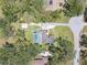 Overhead view of the property showing the pool, large yard, and proximity to other homes and the surrounding area at 11203 Killearn Ct, Riverview, FL 33569
