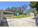View of the backyard, showcasing a convenient storage shed near the house at 11203 Killearn Ct, Riverview, FL 33569