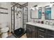Bathroom featuring a walk in shower, stylish fixtures, and a modern design at 11203 Killearn Ct, Riverview, FL 33569
