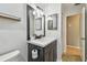 Bathroom featuring a modern vanity sink with a large mirror and decorative lighting at 11203 Killearn Ct, Riverview, FL 33569