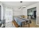 Open dining room with natural light and an elegant light fixture at 11203 Killearn Ct, Riverview, FL 33569