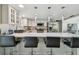 Open kitchen with marble island, stainless steel appliances, and pendant lighting at 11203 Killearn Ct, Riverview, FL 33569