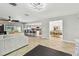 Open-concept living space seamlessly connects the living room, kitchen, and dining areas at 11203 Killearn Ct, Riverview, FL 33569