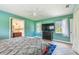 Bright main bedroom with an en-suite bathroom and a view of the backyard at 11203 Killearn Ct, Riverview, FL 33569
