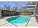 Relaxing screened pool area featuring a refreshing swimming pool with a built-in jacuzzi at 11203 Killearn Ct, Riverview, FL 33569