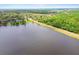 Scenic lake view showcasing waterfront homes in the area at 11203 Killearn Ct, Riverview, FL 33569