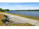 Walking path, bench, and water view at 11203 Killearn Ct, Riverview, FL 33569