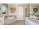 Bright bathroom with a soaking tub, glass enclosed shower, and modern fixtures at 11236 Kingly Ln, Odessa, FL 33556