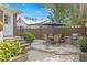 Paver patio with grill and table and chairs for outdoor dining and relaxing at 126 14Th Ne Ave, St Petersburg, FL 33701