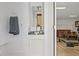 Bathroom with decorative sink, mirror and towel with an open view to the exercise room at 126 14Th Ne Ave, St Petersburg, FL 33701