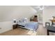 Attic bedroom with ceiling fan, natural light, hardwood floors, and a cozy atmosphere at 126 14Th Ne Ave, St Petersburg, FL 33701