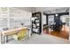 Inviting home office space features a desk, bookcase, and access to the dining room at 126 14Th Ne Ave, St Petersburg, FL 33701