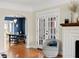 Inviting living room with hardwood floors, fireplace, and adjacent dining area at 126 14Th Ne Ave, St Petersburg, FL 33701