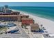 Beautiful beach aerial view of beachfront homes near the ocean with crystal clear blue water at 17606 Lee Ave, Redington Shores, FL 33708
