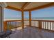 Tile balcony boasts ocean views and space for seating and relaxation at 17606 Lee Ave, Redington Shores, FL 33708