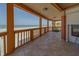 Spacious tiled balcony offers stunning ocean vistas and fresh air at 17606 Lee Ave, Redington Shores, FL 33708