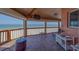 Inviting balcony featuring comfortable seating and ocean views at 17606 Lee Ave, Redington Shores, FL 33708