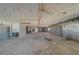 Unfinished basement with concrete floor and exposed pipes, ready for customization and expansion at 17606 Lee Ave, Redington Shores, FL 33708