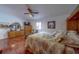Bedroom features hardwood floors and natural light at 17606 Lee Ave, Redington Shores, FL 33708