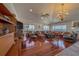 Bright living room boasting expansive ocean views, hardwood floors, and stylish furnishings at 17606 Lee Ave, Redington Shores, FL 33708