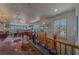 Open-concept living area with hardwood floors, piano, and stunning ocean views at 17606 Lee Ave, Redington Shores, FL 33708