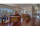 Foyer with hardwood floors and piano with ocean views at 17606 Lee Ave, Redington Shores, FL 33708