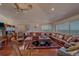 Spacious living room with ocean views, comfortable seating, and hardwood floors at 17606 Lee Ave, Redington Shores, FL 33708