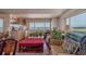 Living room with hardwood floors, ocean view and wet bar at 17606 Lee Ave, Redington Shores, FL 33708