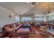 Expansive living room featuring ocean views, hardwood floors, and a cozy seating arrangement at 17606 Lee Ave, Redington Shores, FL 33708