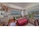 Bright living room with hardwood floors, ocean view and wet bar at 17606 Lee Ave, Redington Shores, FL 33708