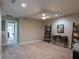 Bonus room with neutral walls, ceiling fan, and space for recreation or hobbies at 17847 Althea Blue Pl, Lutz, FL 33558