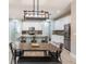 Well-designed kitchen with stainless appliances, granite countertops, and seamless living area access at 17847 Althea Blue Pl, Lutz, FL 33558