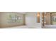 Bright bedroom featuring neutral walls, and a view of the backyard pool area at 18002 Avalon Ln, Tampa, FL 33647