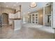Open floor plan with an eat-in kitchen and living room with custom built-ins at 18002 Avalon Ln, Tampa, FL 33647