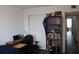 Bedroom with desk and chair, hardwood floors and plenty of storage at 2020 World Parkway Blvd # 12, Clearwater, FL 33763